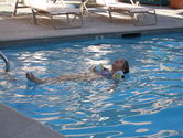 Floating on her back