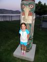 Kaija with a totem poll in Peachland