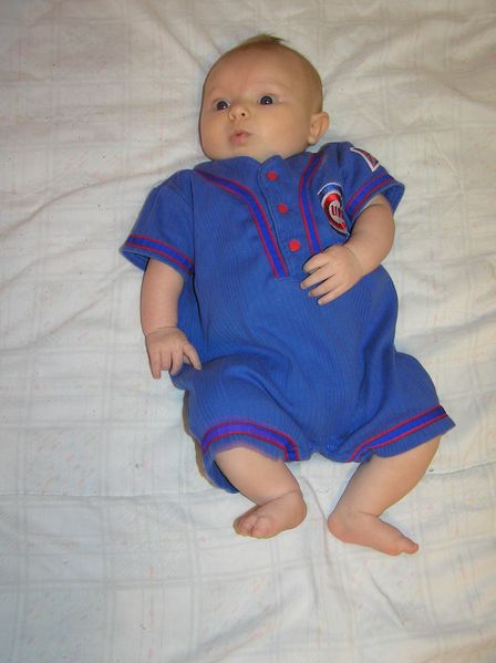 Wearing her Cubbies onesie
