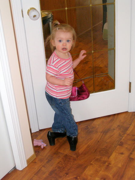 Wearing Mommy's shoes
