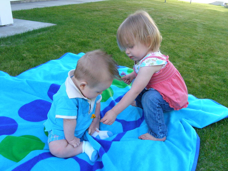 Maddi giving James another flower
