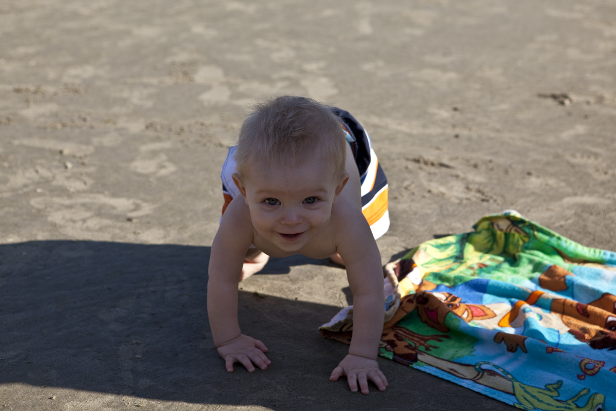 Thomas doing his spider crawl over the sand

