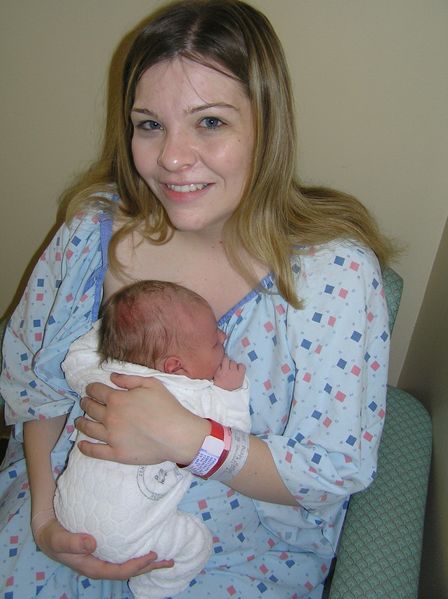 Mommy holding a less than day-old Maddi
