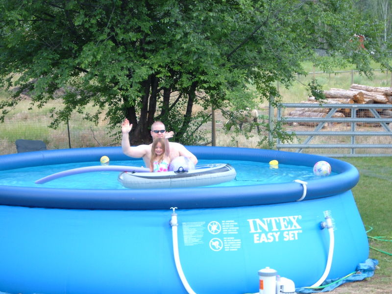 Kaija and Daddy in Nana's pool
