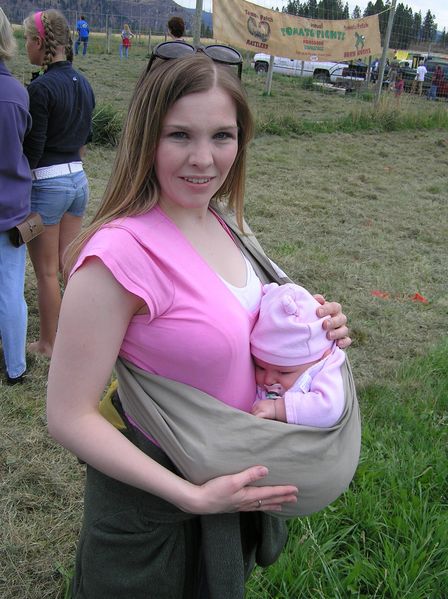 Maddi chilling in the sling, which she is almost too big for
