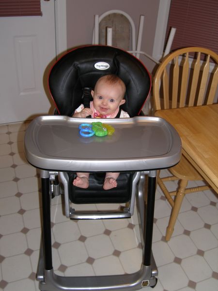 Maddi in her highchair
