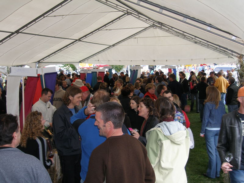 The crowd inside the wine tasting tent
