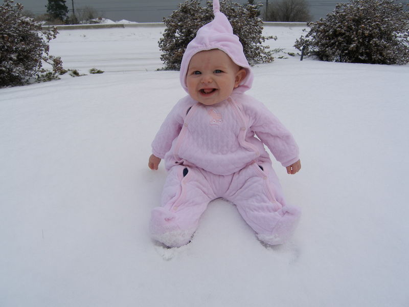 Maddi's first ever in-snow picture!
