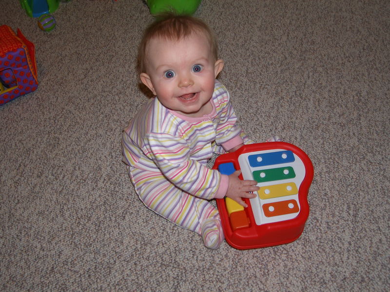 Maddi playing her piano
