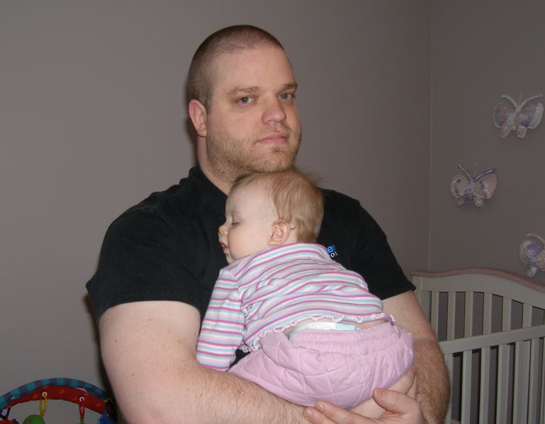 Snuggles with Daddy ater a long day for both
