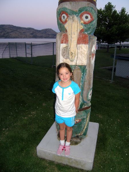 Kaija with a totem poll in Peachland
