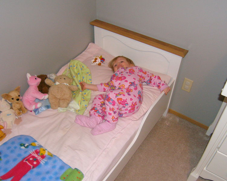 Laying in her new bed for the first time

