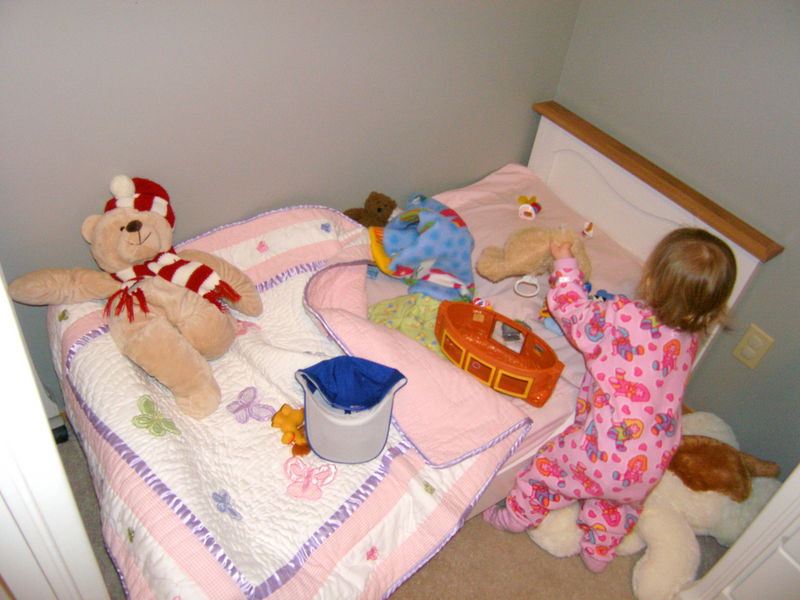 Maddi promptly put every single toy in her room on her new bed
