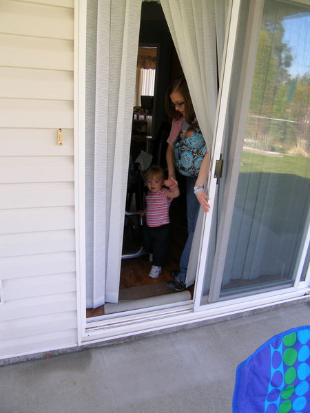 Maddi coming out into the backyard
