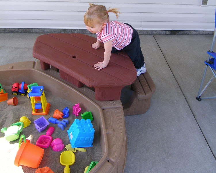 Maddi inspecting her new sandbox
