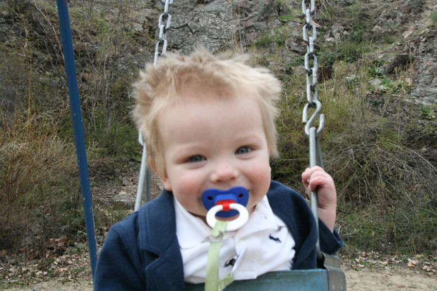 He loves the swings!

