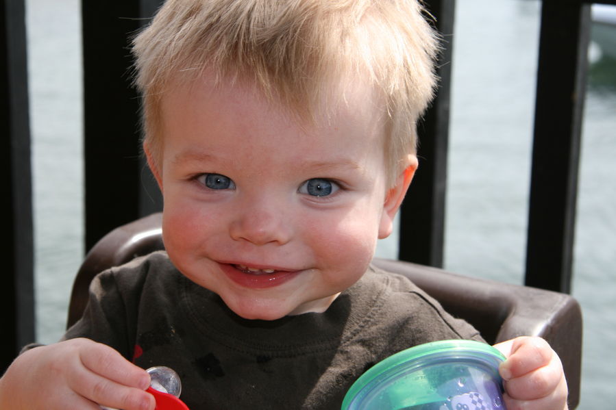 So happy; look at those chubby cheeks!
