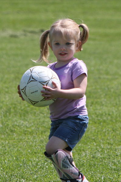 She has yet to figure out that you don't carry the ball
