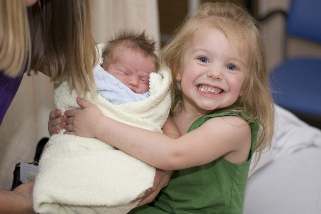 Maddi holding Thomas for the first time
