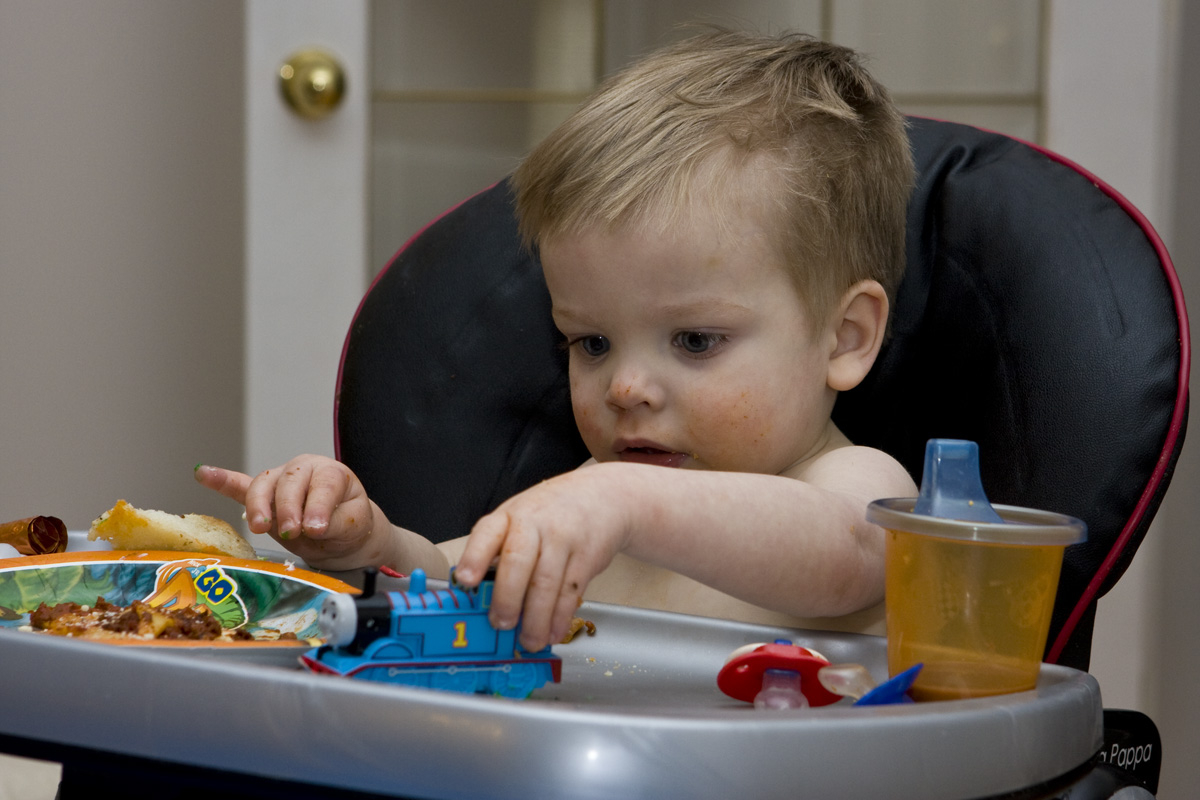 James playing with the cake topper
