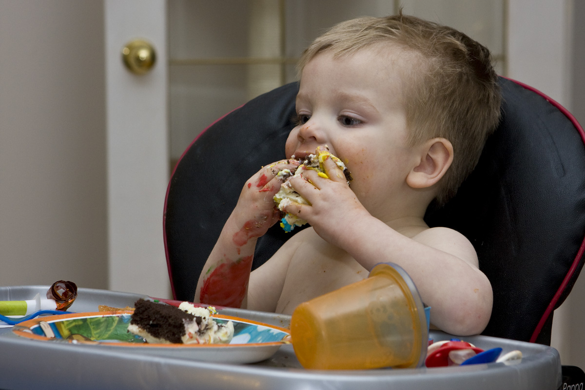 James doing the double-fisted cake cram
