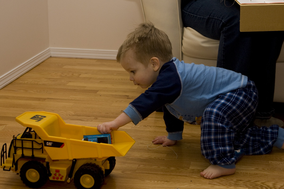Pushing around his new dump truck
