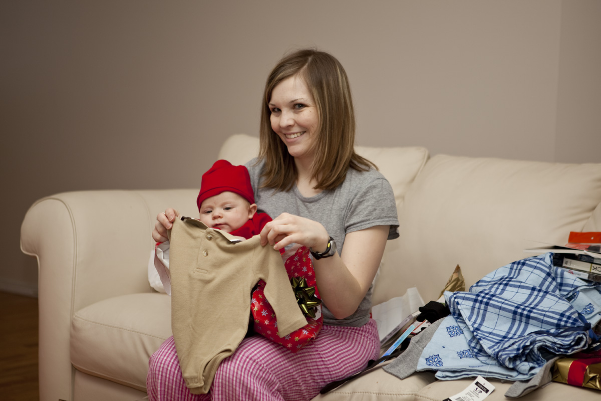 Thomas' first present unwrapping, with a little help from Mommy
