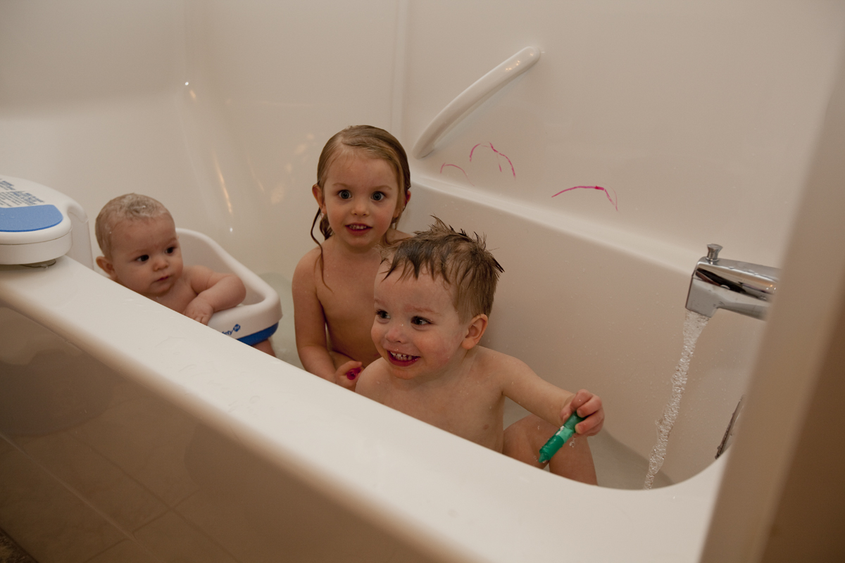 This was Thomas' first bath with his older siblings.  He loved it, as did they.
