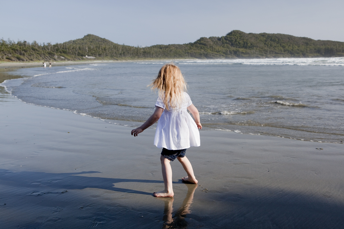 Maddi playfully running from the water
