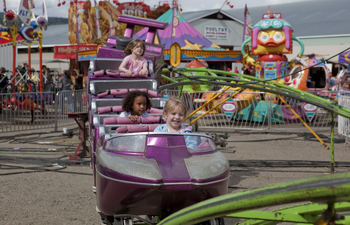 Maddux on the kiddie coaster
