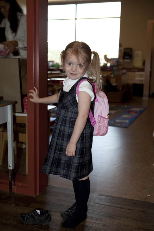 Maddux changing her shoes on her first day at Aberdeen
