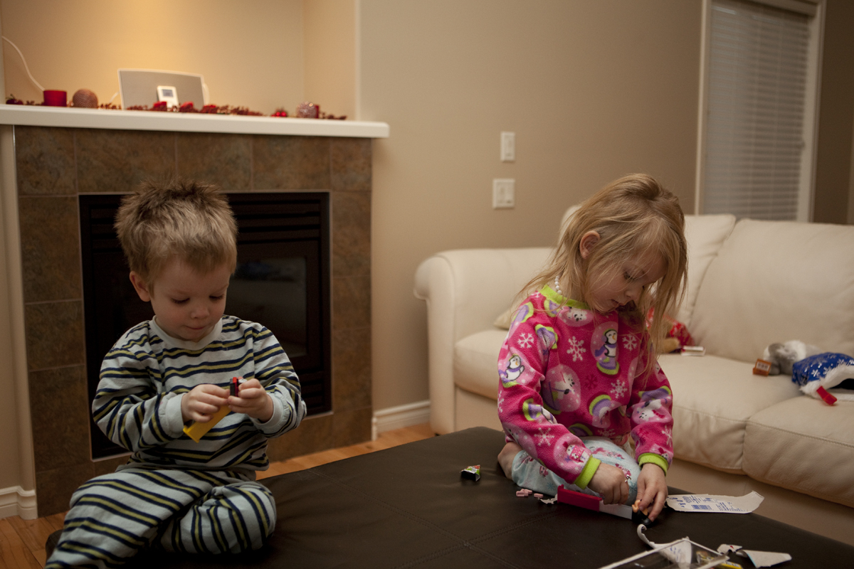 Maddux and James playing with their Pez dispensers
Keywords: Maddux James