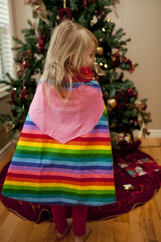 Maddux in her monogrammed superhero cape
Keywords: Maddux